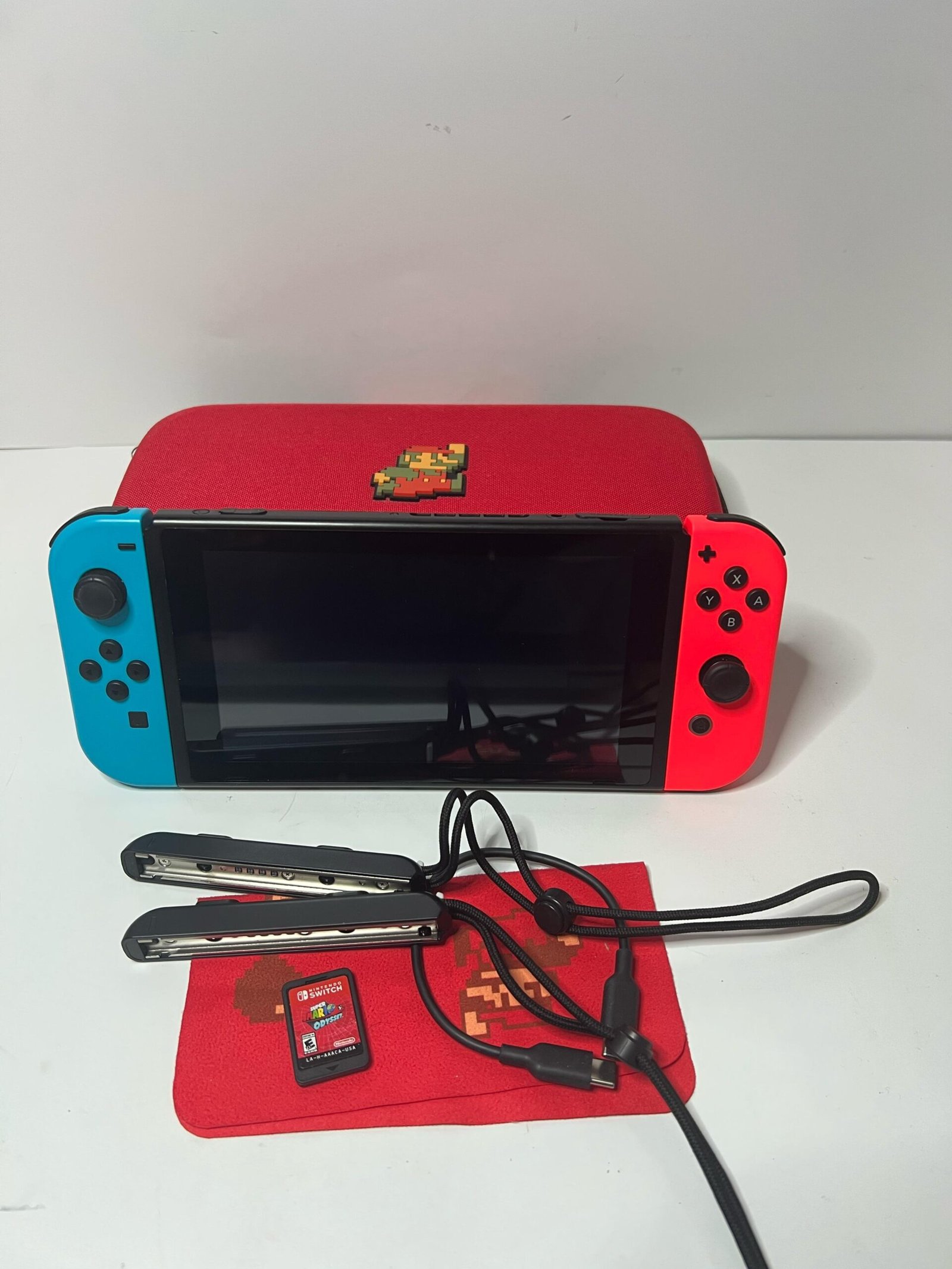 Nintendo Switch Super Mario Odyssey Bundle – neon blue/red Joy-Con, themed dock & physical game card included!