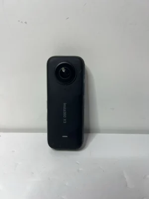 Used Insta360 X3 5.7K Action Camera in black, showing its scuffed lens and main body.